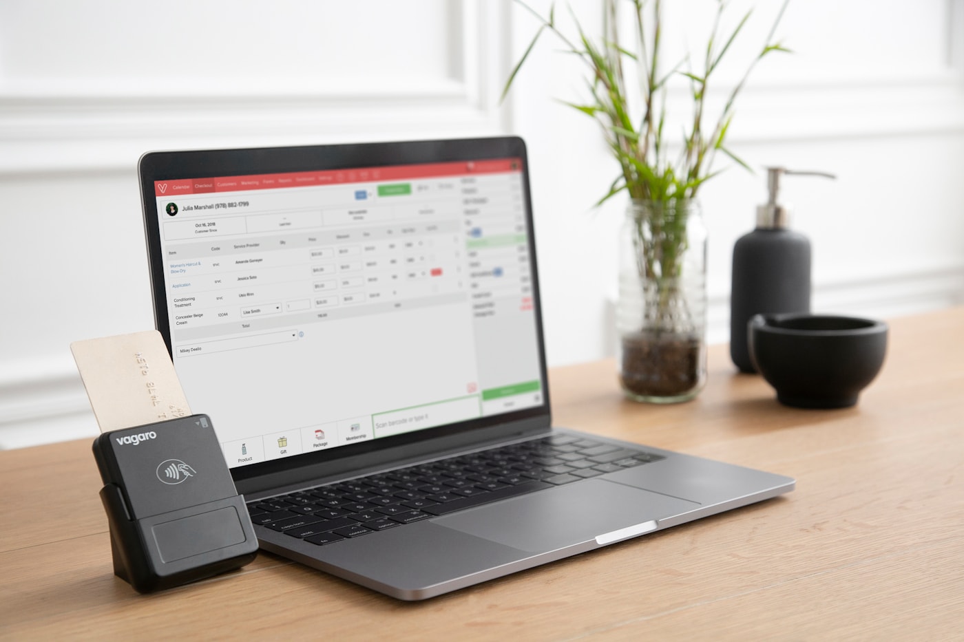 Digital payment terminal and laptop representing ISP billing